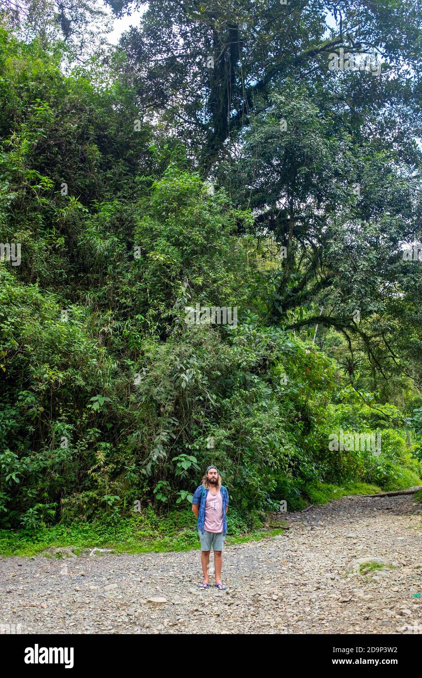 ENVIGADO, COLOMBIA - Nov 05, 2020: Envigado, Colombia - November 22 2019: White Man Using a Blue Cap, Shorts and a Pink Shirt, Standing and Looking at Stock Photo