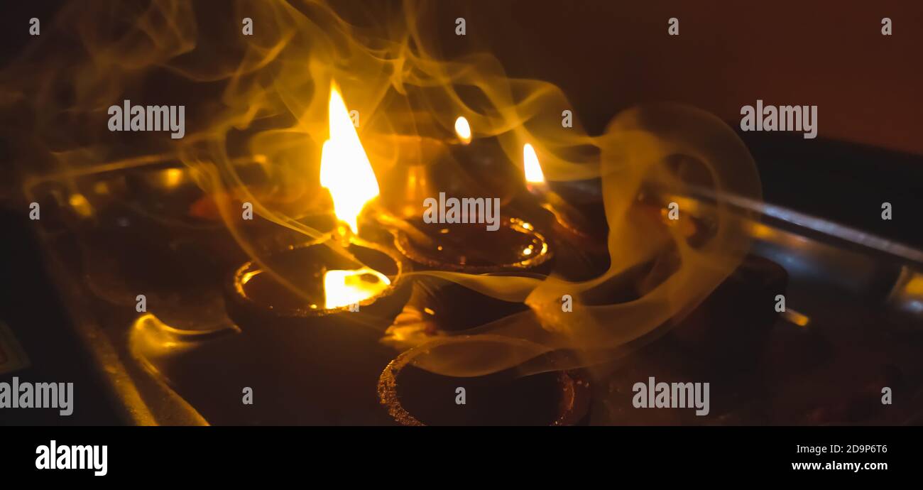 Indian oil lamps of lighting on Temple at Diwali Night. Diwali Oil lamps Festival Stock Photo