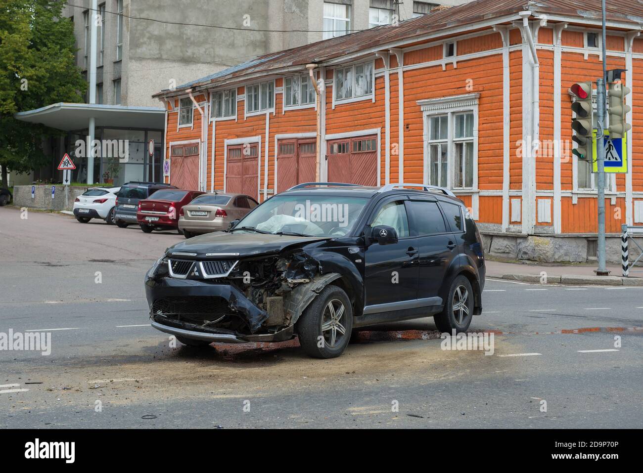 SORTAVALA, RUSSIA - AUGUST 15, 2020: Broken Mitsubishi Outlander car on city street Stock Photo