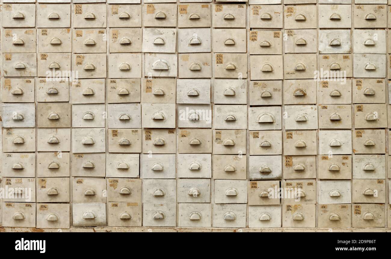 Backgrounds and textures: old wooden cabinet with drawers, front view Stock Photo