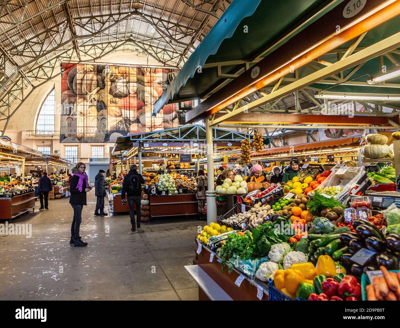 The central market in Riga, capital of Latvia, in the Baltic region of northern Europe. The market is in a building that once housed zeppelins. Stock Photo