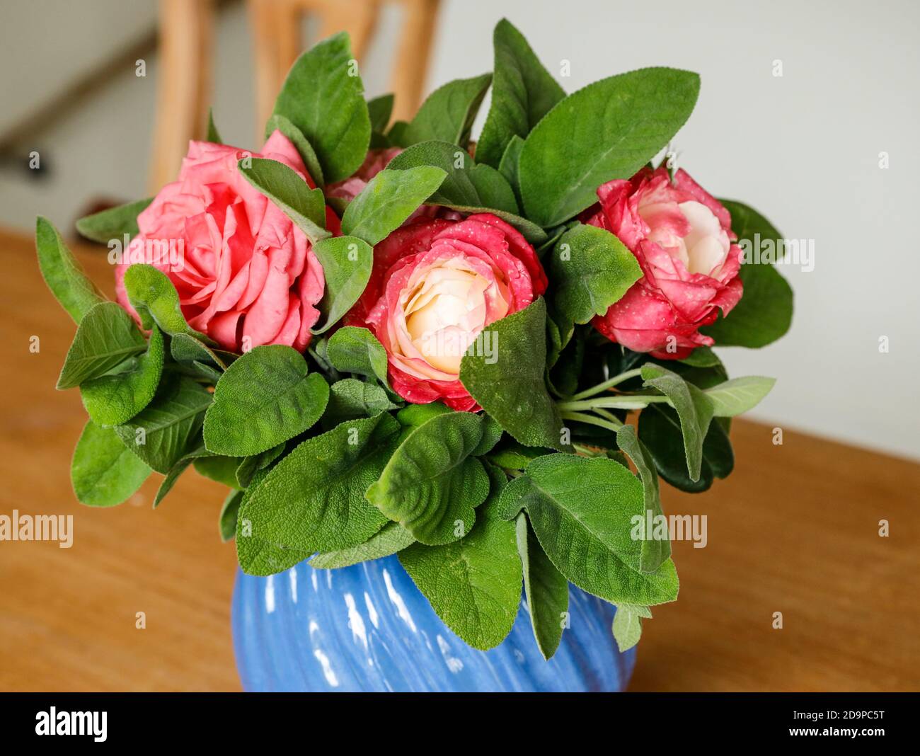 Bouquet of flowers with roses and sage Stock Photo