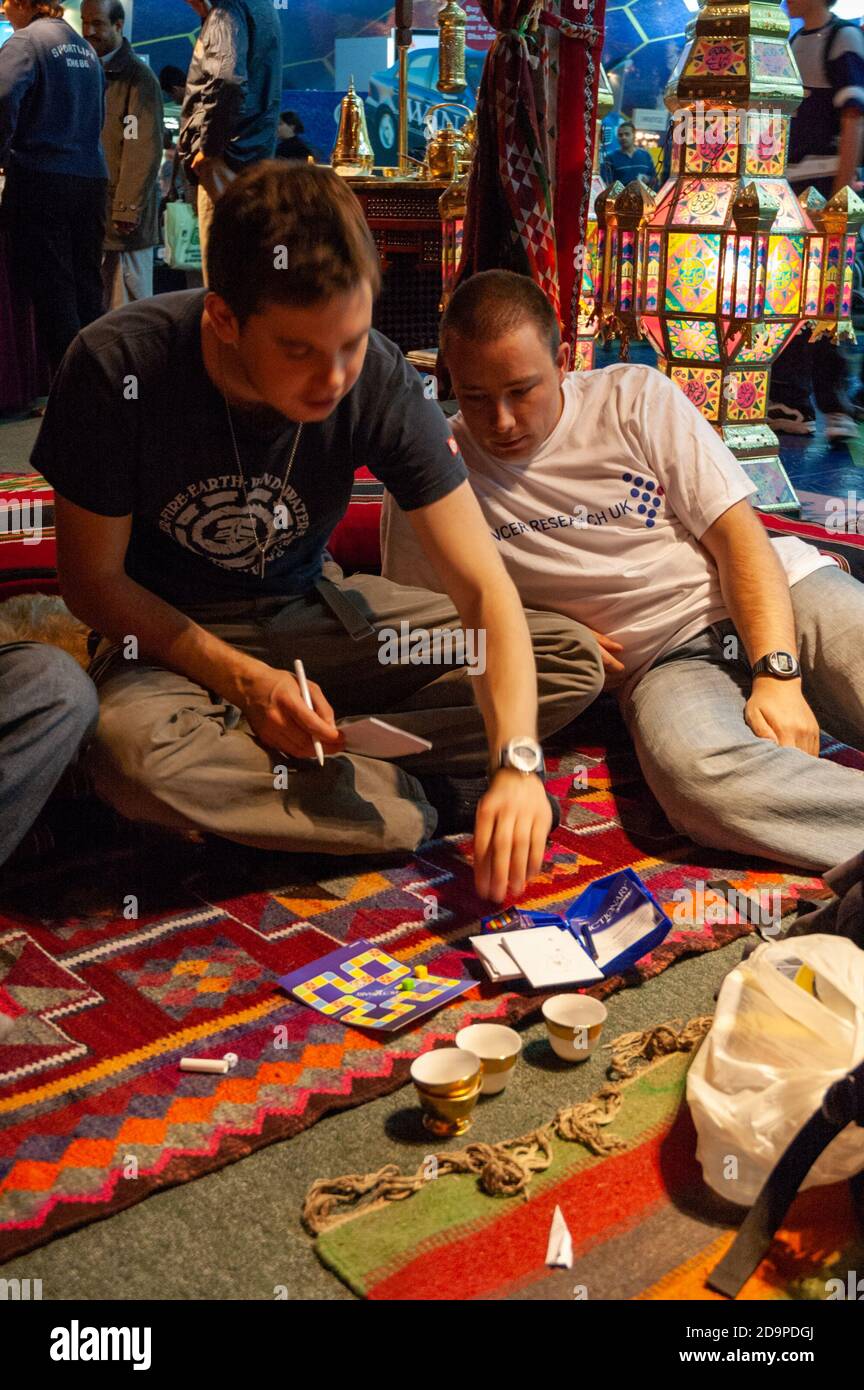 Playing board games in Abu Dhabi Airport Stock Photo Alamy