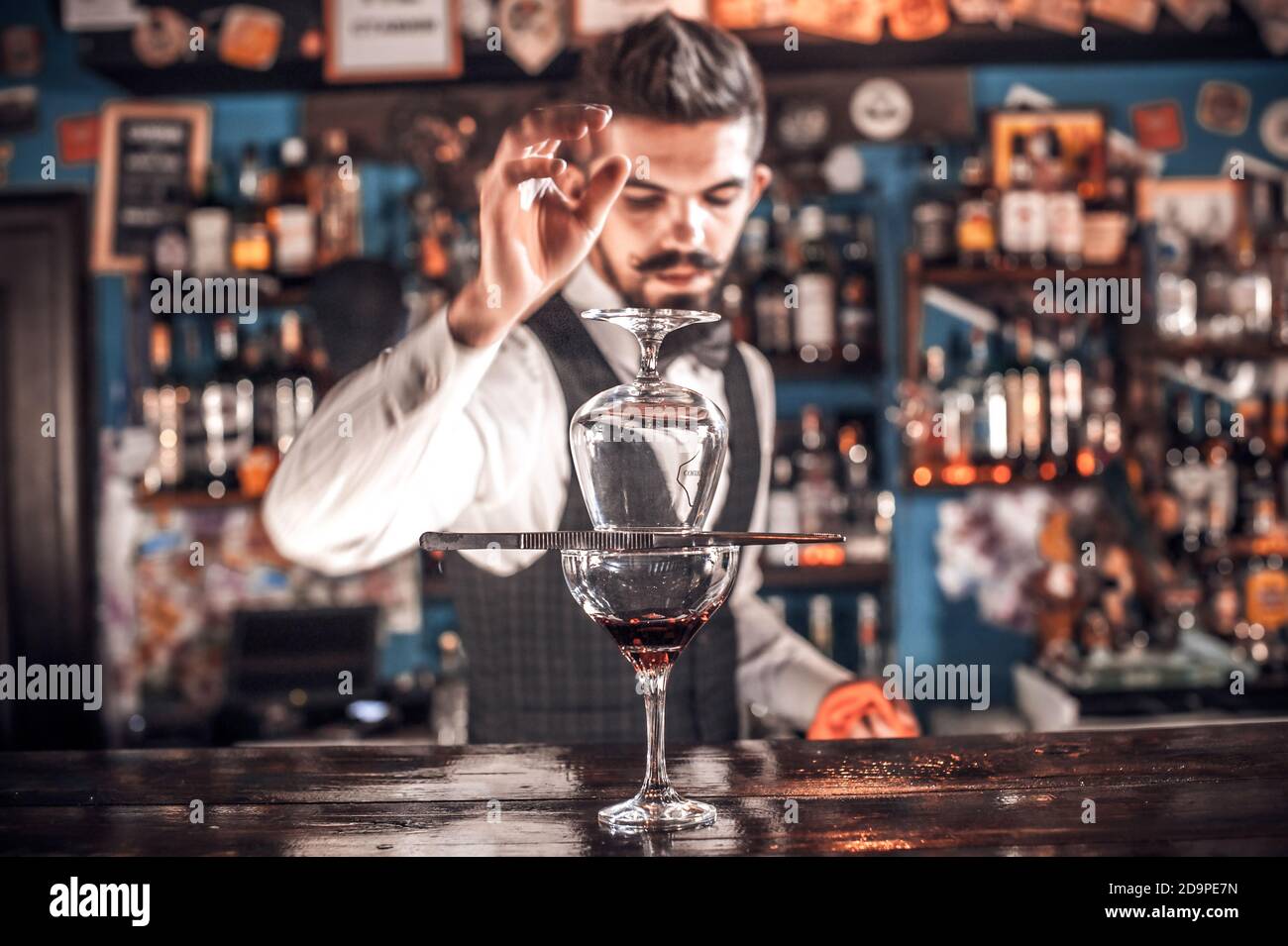 Charismatic Female bartender is pouring a drink in the nightclub Stock  Photo - Alamy