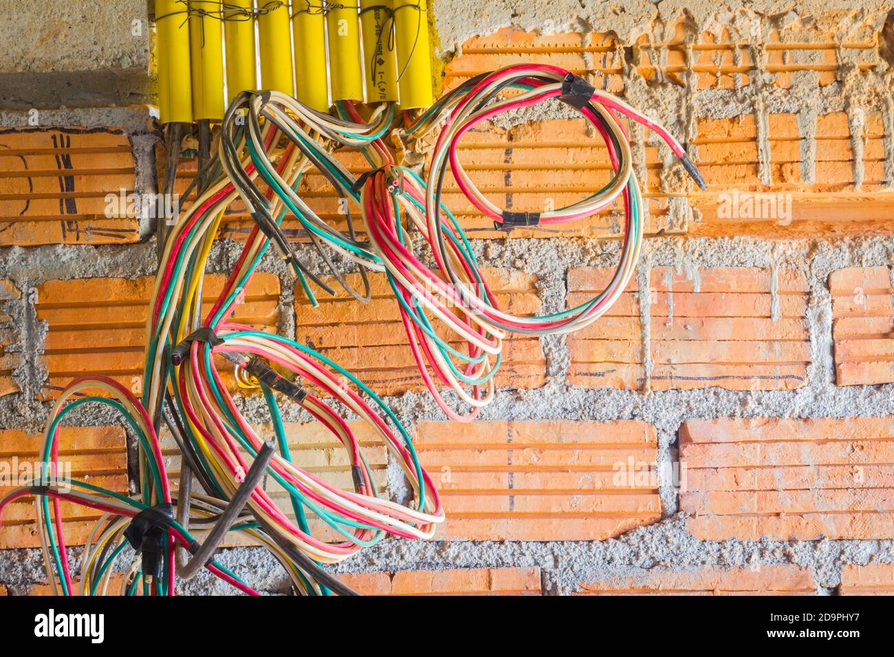 different colored cables for power outlet installation in construction
