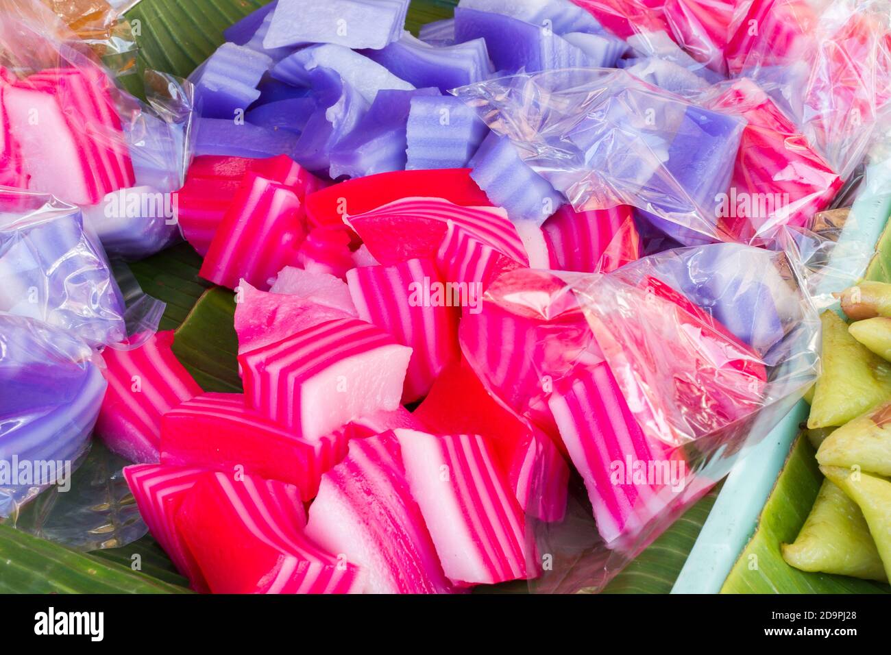 Kind of Thai sweetmeat, Multi Layer Colorful Sweet Cake Pandan (Kanom Chan Pandan) Stock Photo