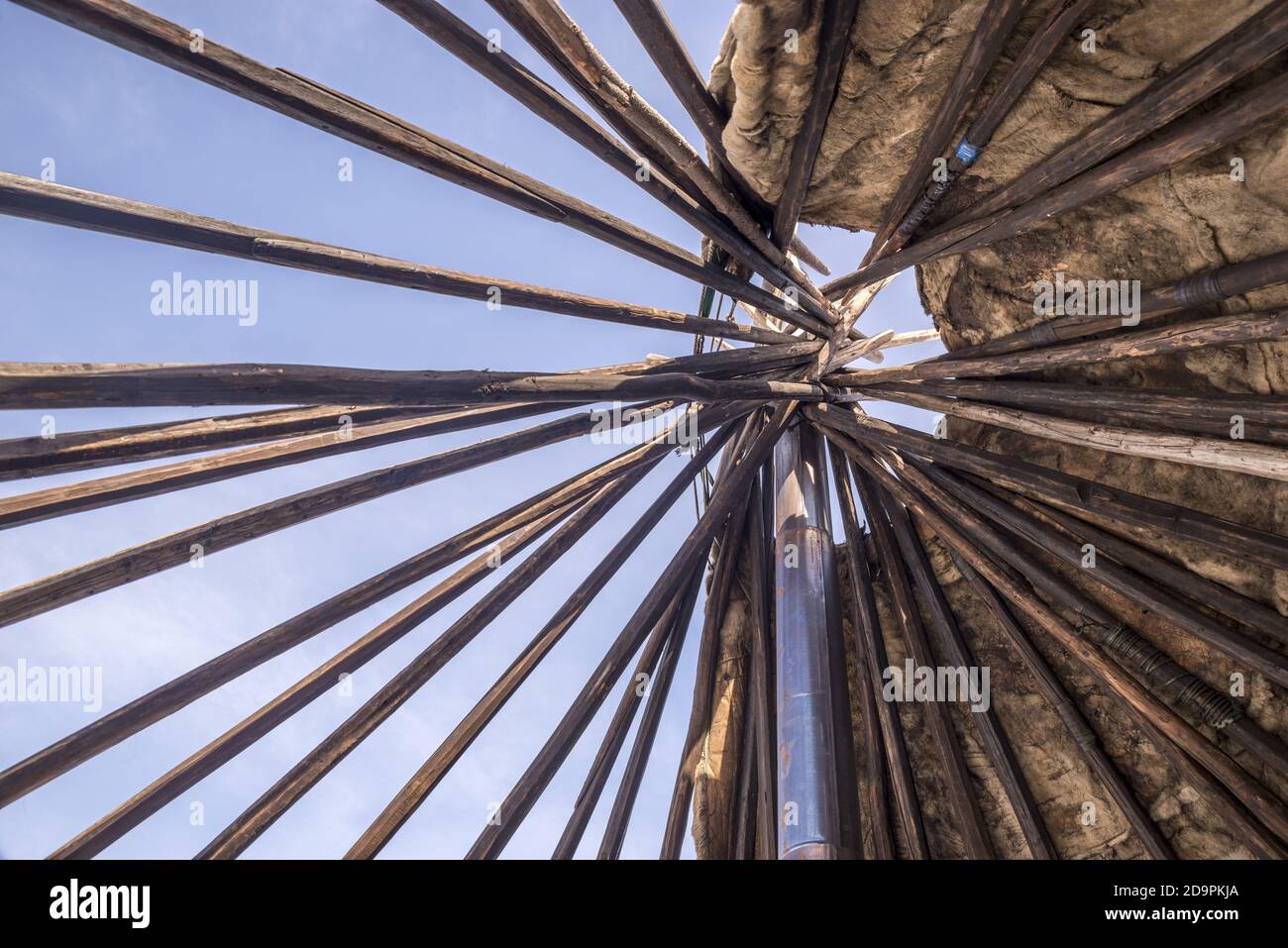 Wooden poles and chimney of a chum (traditional tent) of Nenets people, Yamalo-Nenets Autonomous Okrug, Russia Stock Photo