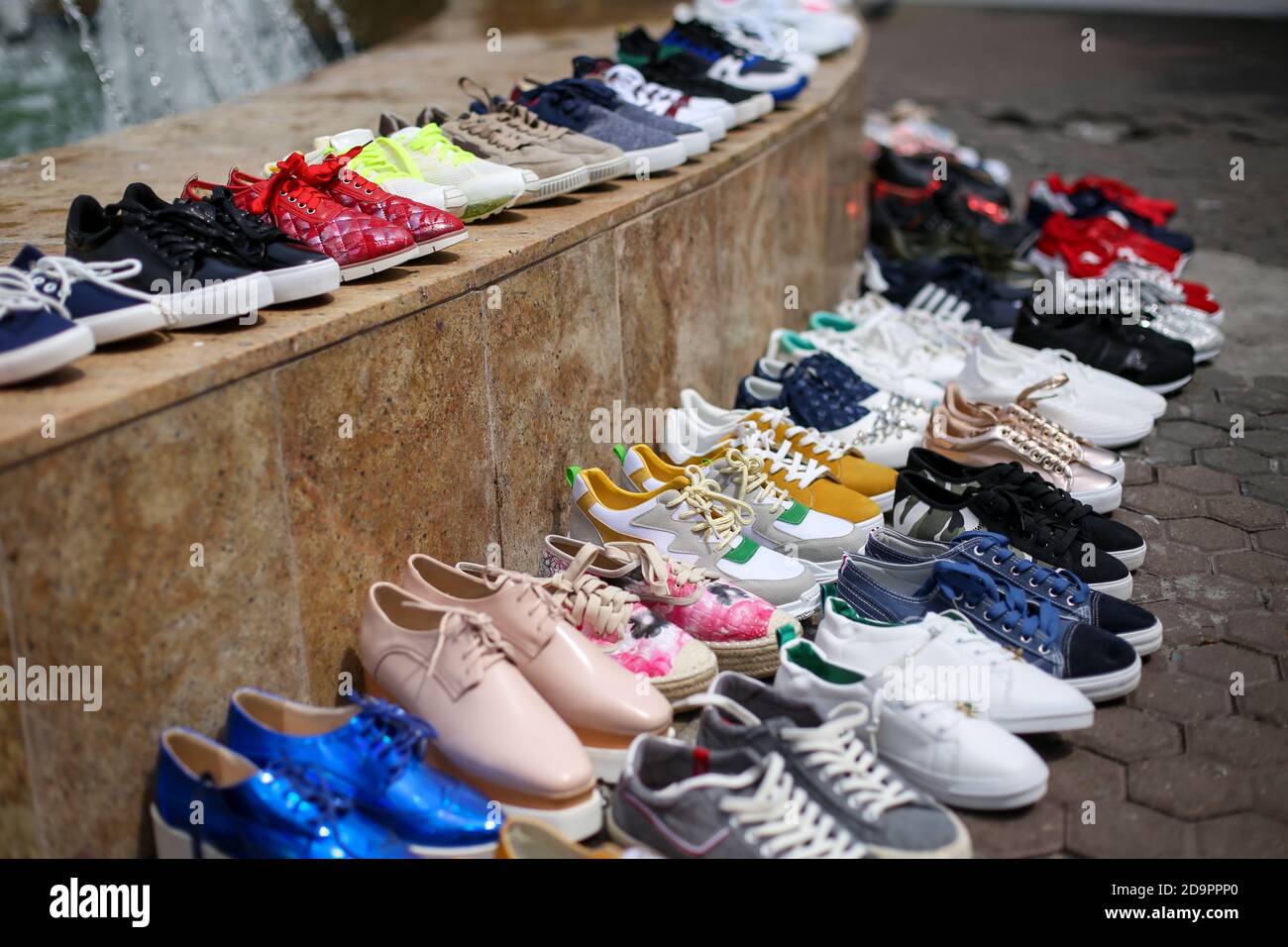 Bucharest, Romania - May 17, 2019: Shallow depth of field (selective focus)  image with various types of women sneakers on the pavement as a form of pr  Stock Photo - Alamy
