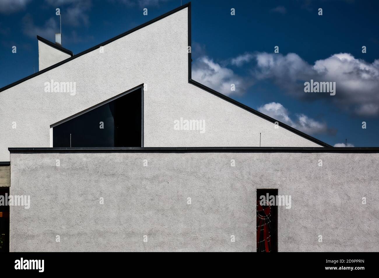 Shot of a modern white house with blue sky in the background Stock ...