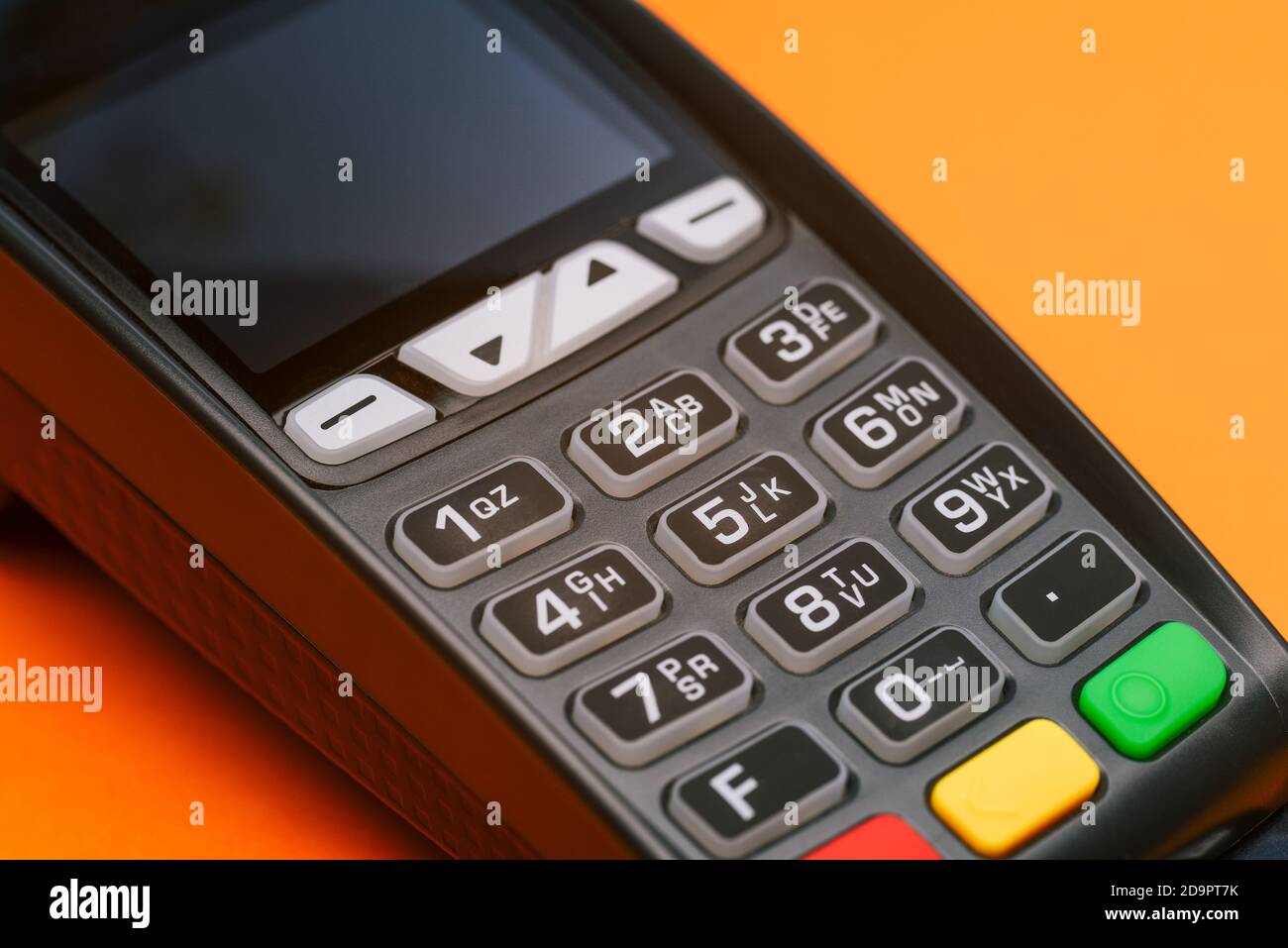 Close-up of a credit card machine. Contactless and cashless acceptance of payments by bank card or phone. Terminal for paying for purchases. Customer Stock Photo