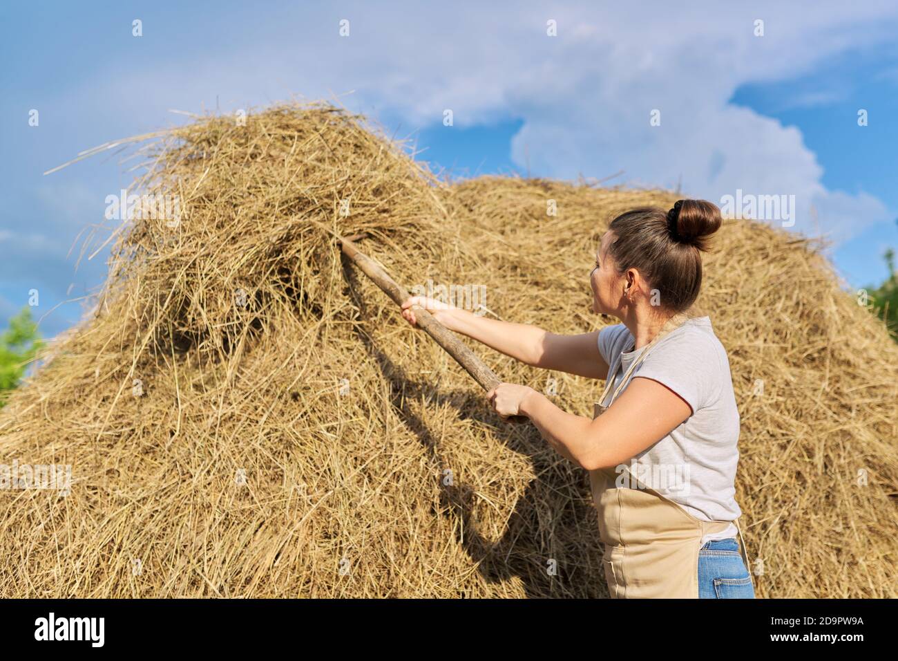 Cheerful farmer in straw hi-res stock photography and images - Alamy