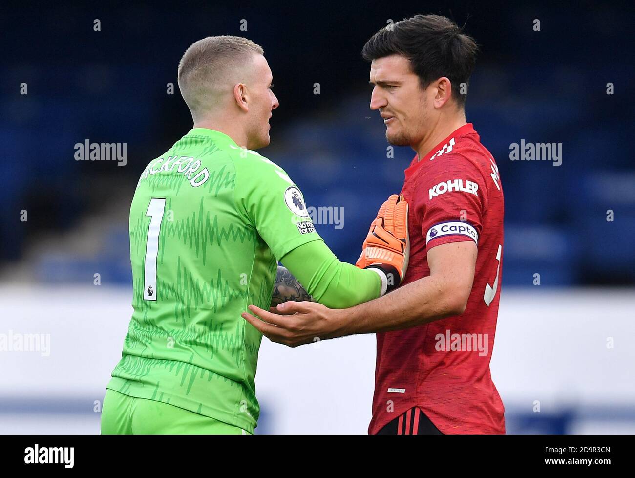 Everton Goalkeeper Jordan Pickford Left And Manchester United S Harry Maguire Clash During The Premier League Match At Goodison Park Liverpool Stock Photo Alamy