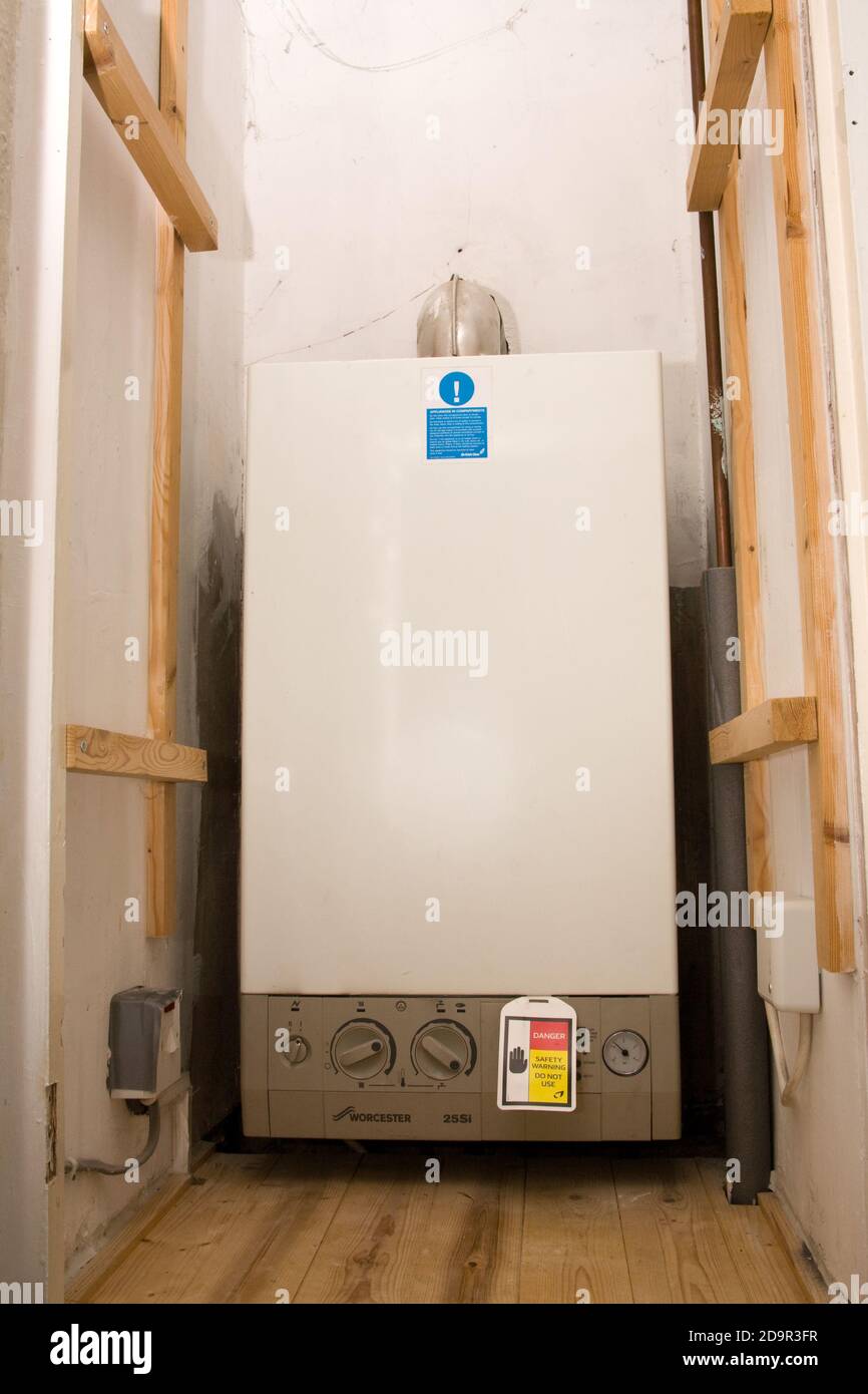 British central heating boiler broken, condemned and shut down by British  Gas Stock Photo - Alamy