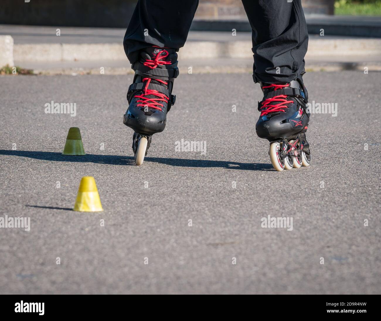 Bucharest/Romania - 10.17.2020: Man on rollerblades or Inline skates learning how to skate in the park. Stock Photo