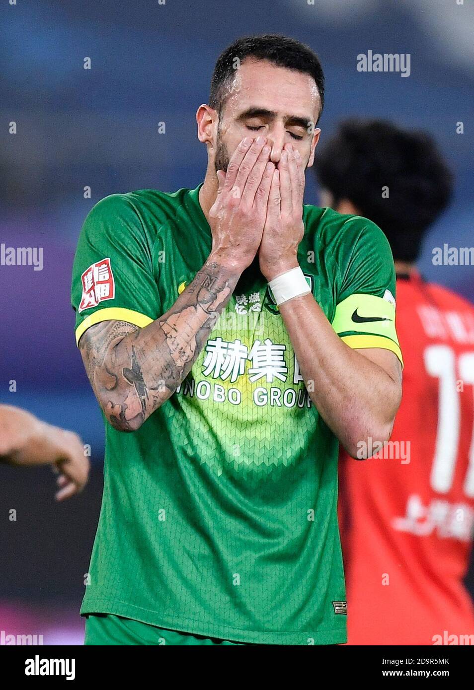 Suzhou, China's Jiangsu Province. 7th Nov, 2020. Renato Augusto of Beijing Guoan reacts during the 19th round match between Beijing Guoan and Shanghai SIPG at the 2020 season Chinese Football Association Super League (CSL) Suzhou Division in Suzhou, east China's Jiangsu Province, Nov. 7, 2020. Credit: Xu Chang/Xinhua/Alamy Live News Stock Photo