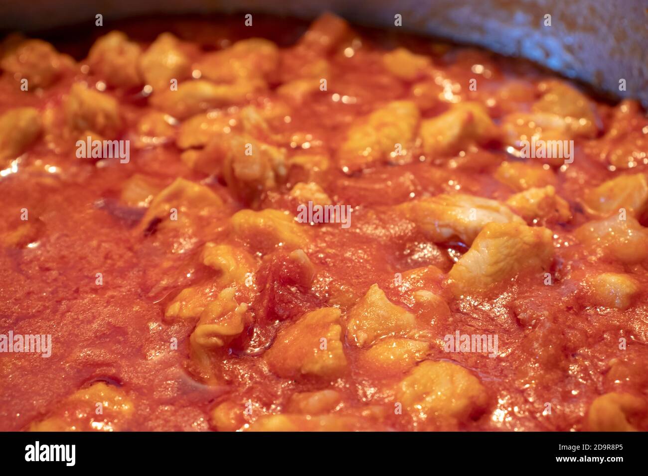 A pot full of chicken sauce, made with only the tomato sauce and the
