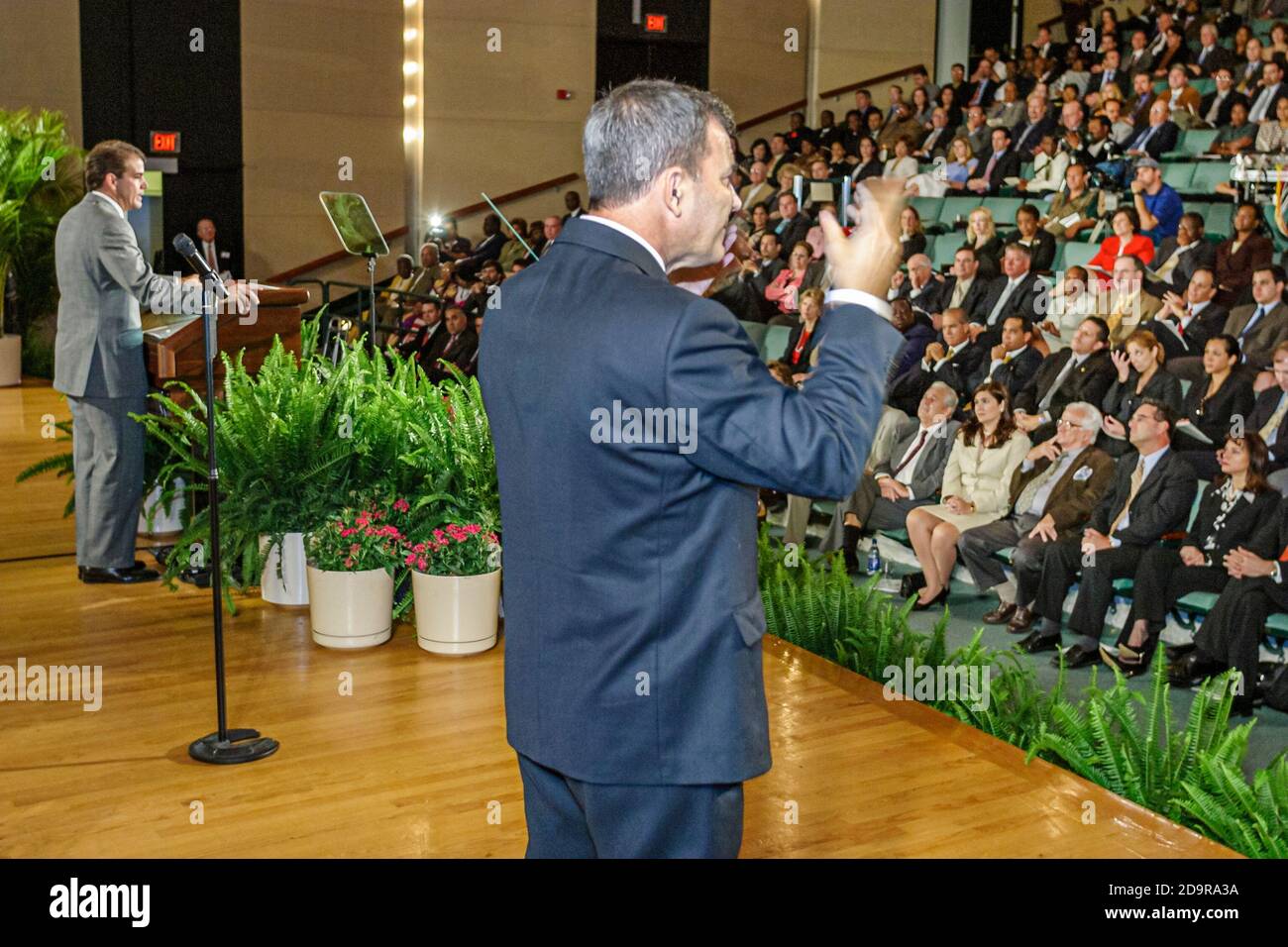 Miami Florida,Coral Gables University of Miami Gusman Hall,annual State of the County Address,man male interpreter translates speech sign language dea Stock Photo