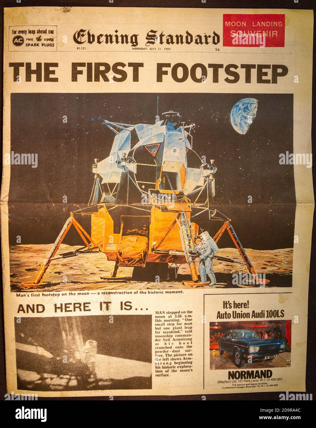 Front page showing the First Footstep of Neil Armstrong, Apollo 11 Moon landings in an Evening Standard souvenir newspaper (replica), 21st July 1969. Stock Photo