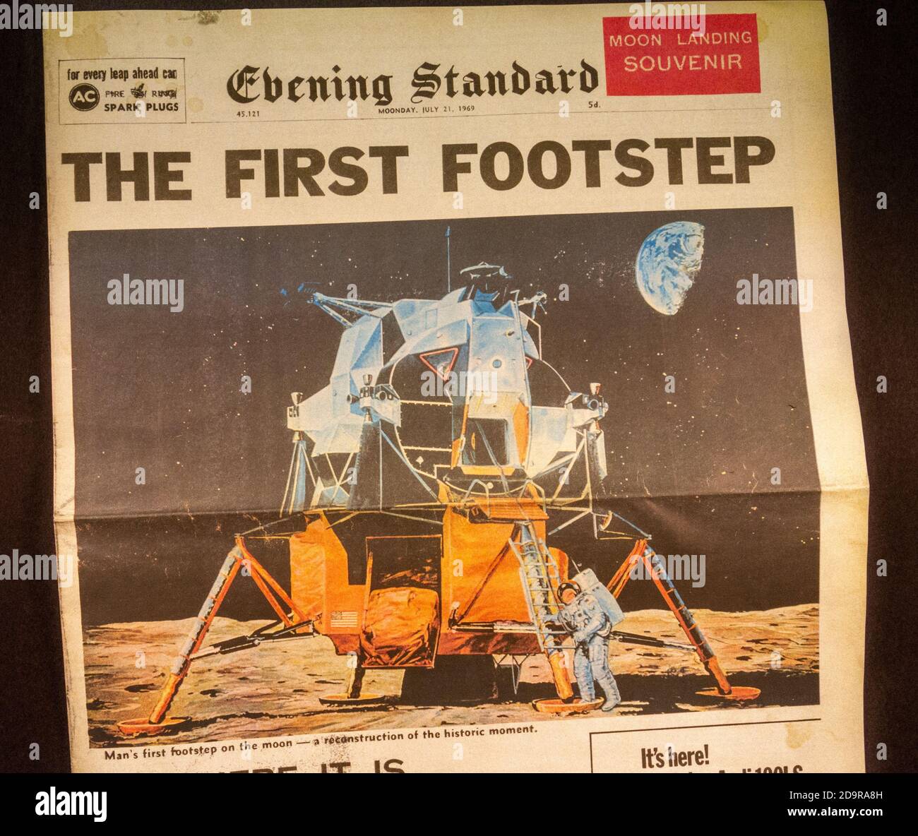Front page showing the First Footstep of Neil Armstrong, Apollo 11 Moon landings in an Evening Standard souvenir newspaper (replica), 21st July 1969. Stock Photo
