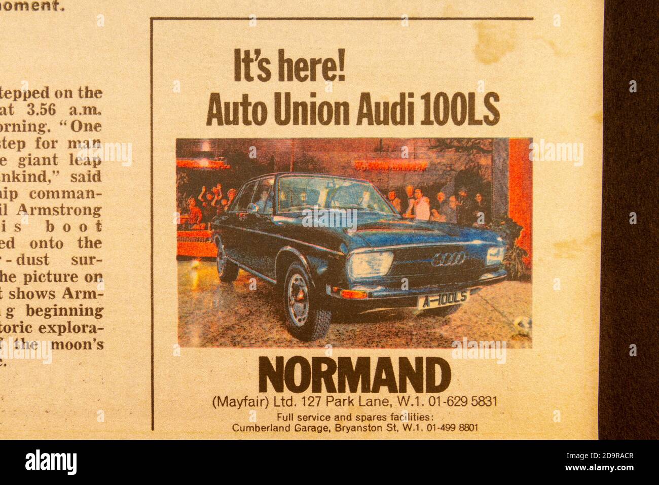 Advert for Auto Union Audi 100LS Normand car inside an Evening Standard souvenir newspaper (replica) for the Apollo 11 Moon landings on 21st July 1969 Stock Photo