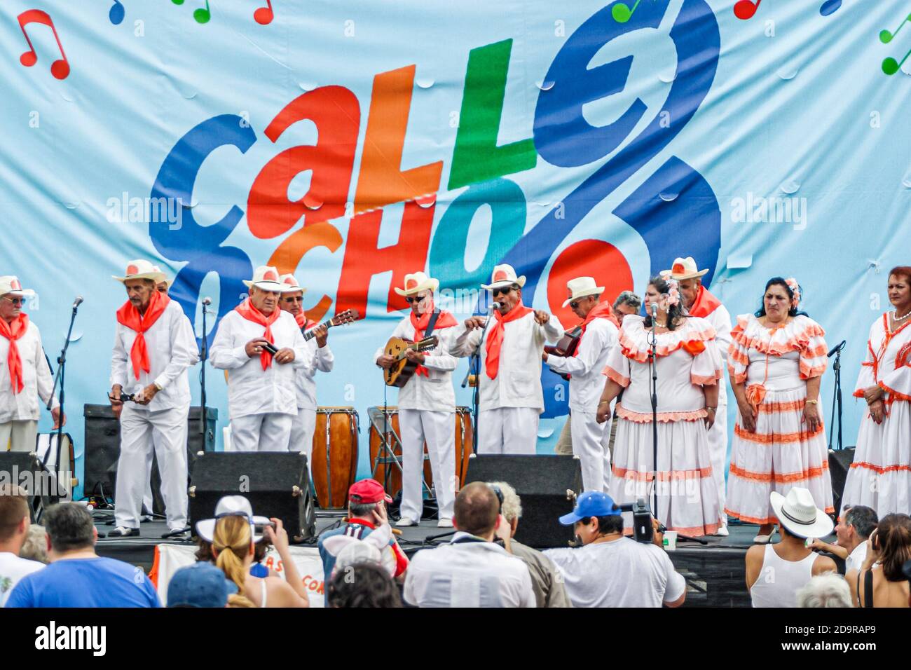 Miami Florida,Little Havana,Calle Ocho Festival fair,Hispanic women men,singing playing guitar musicians performing stage wearing national costume Stock Photo