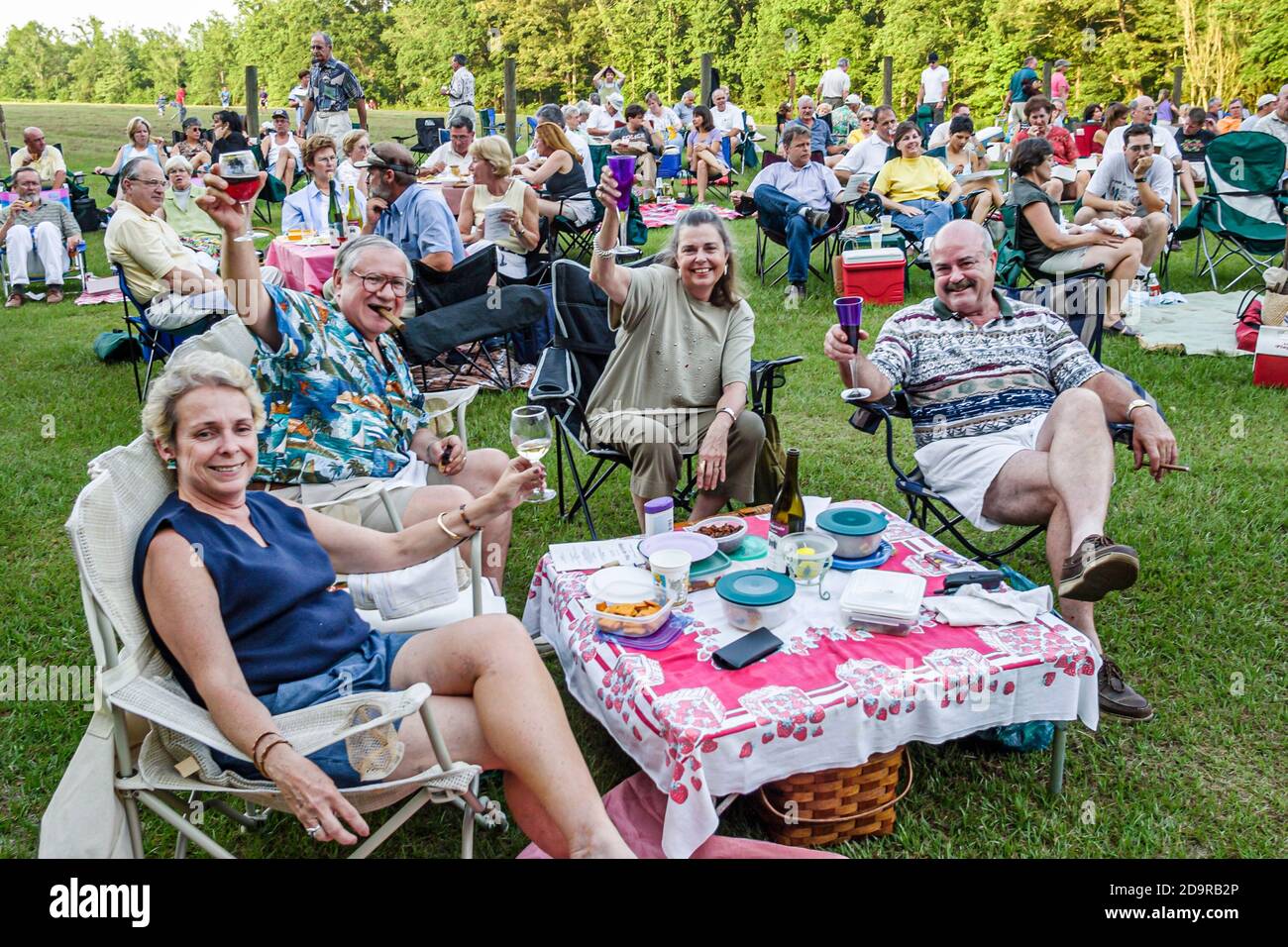 Louisiana Northshore,Mandeville Pontchartrain Vineyards,Jazz'n the Vines Outdoor Concert Series,audience drinks lawn picnic man women couples friends, Stock Photo