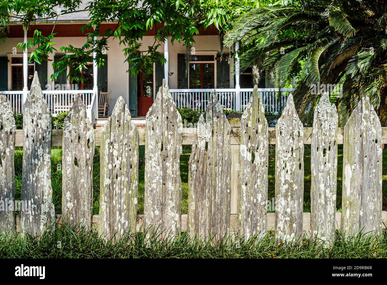 Louisiana Northshore,Madisonville,historic private home residence house front,weathered wooden picket fence, Stock Photo