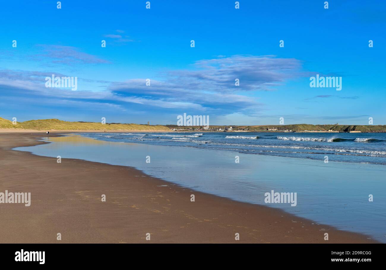 CRUDEN BAY ABERDEENSHIRE SCOTLAND BLUE SEA AND SKY OVER THE EXTENSIVE SANDY BEACH Stock Photo