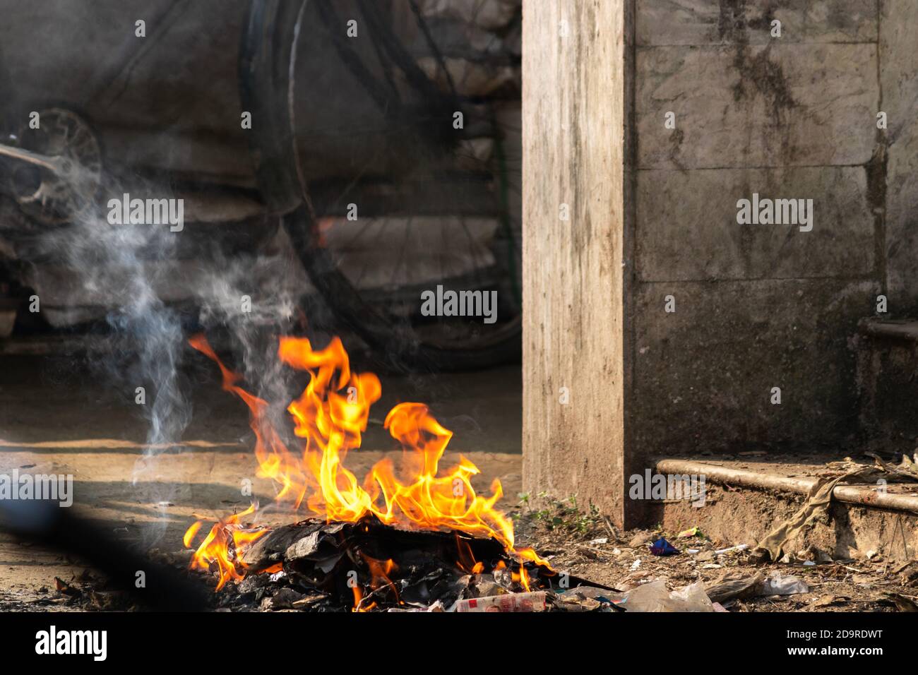 People are burning down plastic wastes without caring about proper disposal Stock Photo