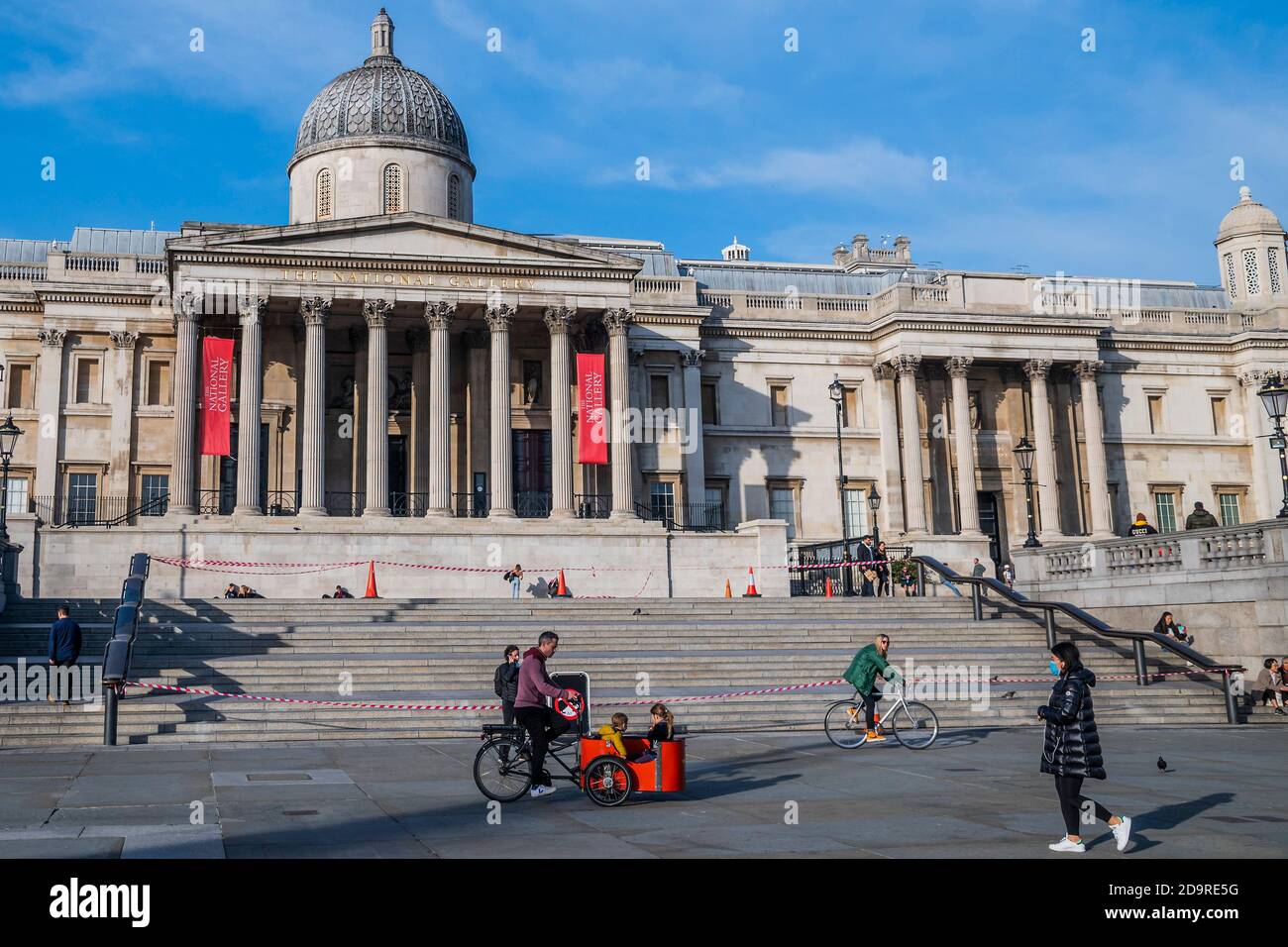 London, UK. 07th Nov, 2020. The second lockdown is underway but Trafalgar Square is fairly busy with visitors, some of whom have cycled but many must have come by public transport. The number of visitors does not appear to be dramatically reduced despite the increasing of Coronavirus (COVID-19) lock-down restrictions. Credit: Guy Bell/Alamy Live News Stock Photo