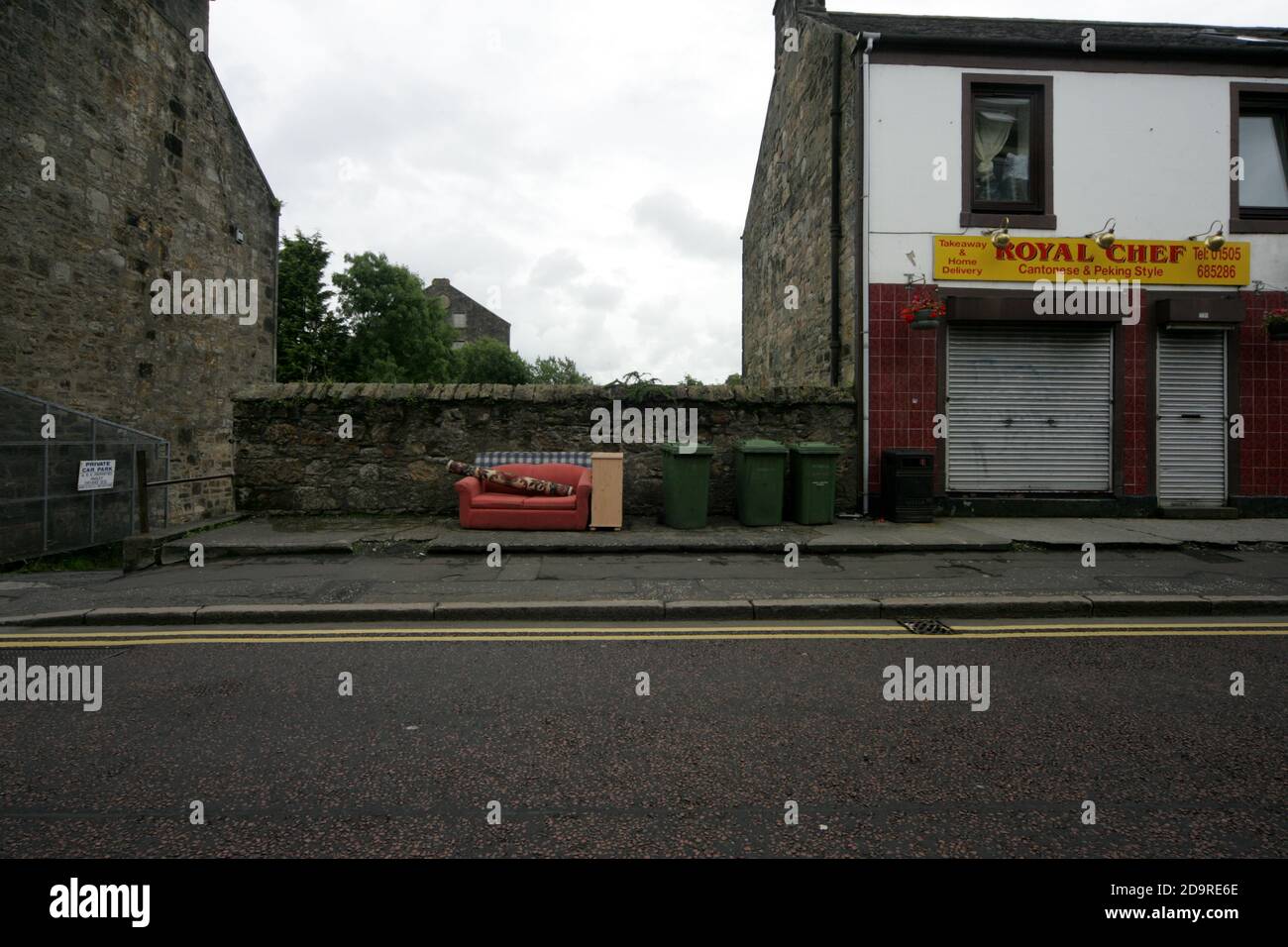 Kilbirnie North Ayrshire, Scotland, UK. abandoned furntiture on street