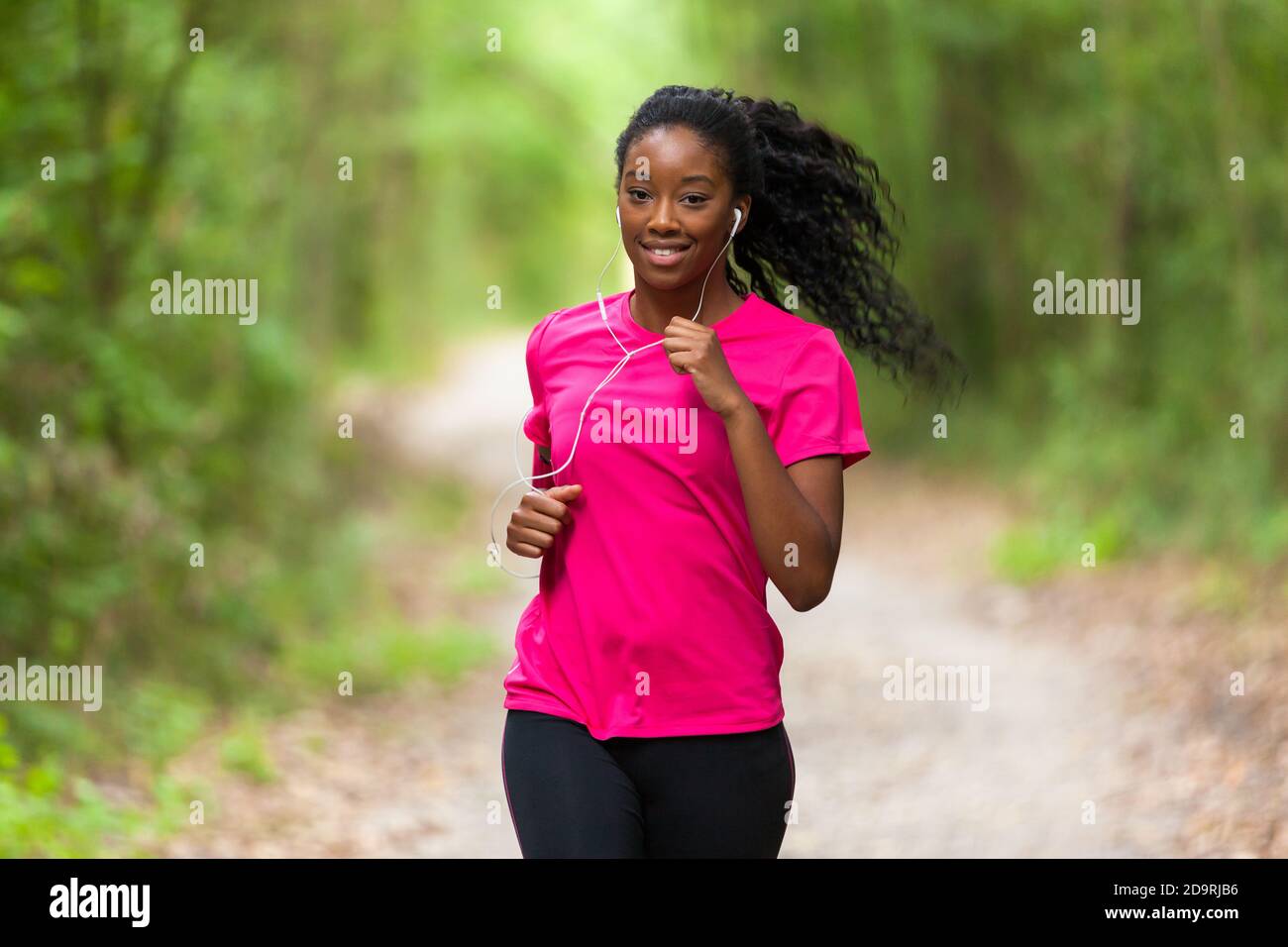 Portrait, start and black woman with race, training and healthy girl  against a studio background. Face, female person and runner with endurance  Stock Photo - Alamy