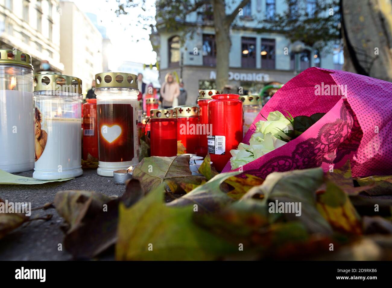 Vienna, Austria. 7th Nov, 2020. People mourn the victims of the terrorist attack on November 02, 2020. Picture shows flowers and candles at the crime scene. Stock Photo
