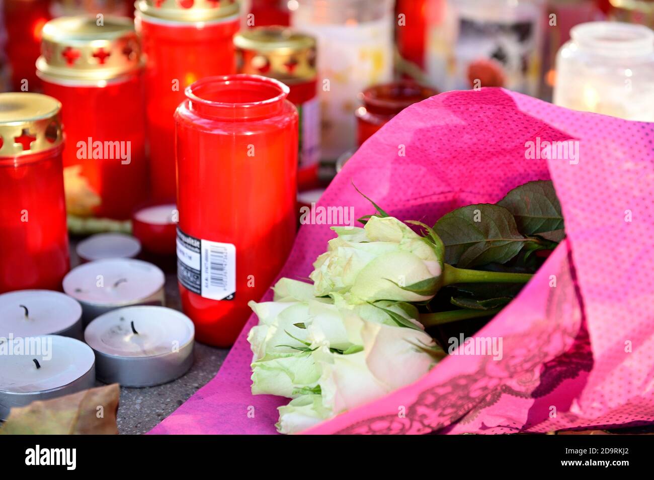 Vienna, Austria. 7th Nov, 2020. People mourn the victims of the terrorist attack on November 02, 2020. Picture shows flowers and candles at the crime scene. Stock Photo