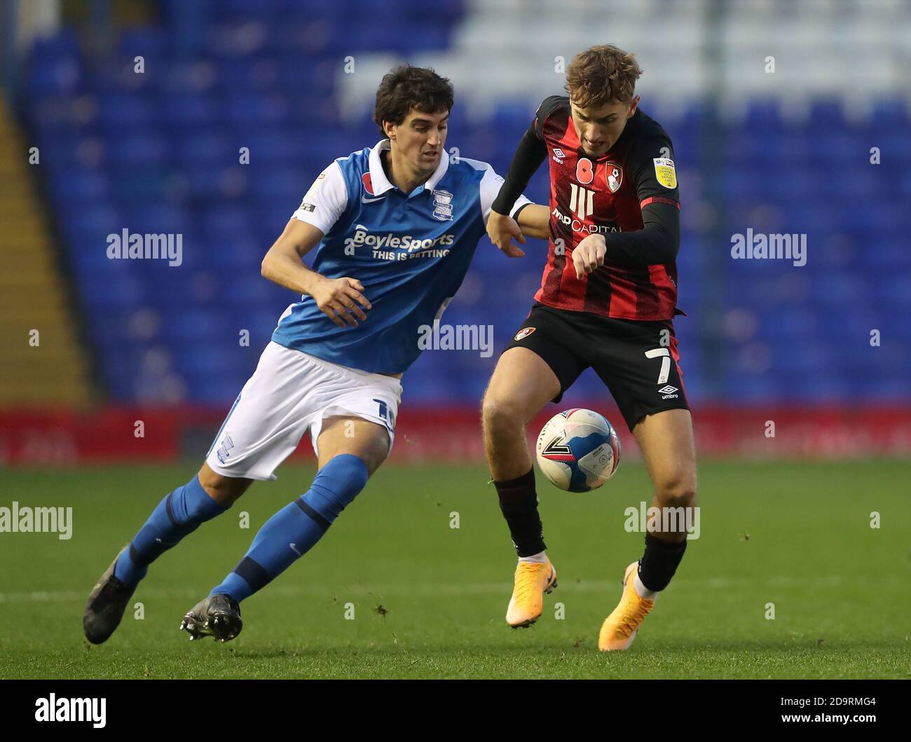 Birmingham City's Mikel San Jose (left) and AFC Bournemouth's David Brooks battle for the ball during the Sky Bet Championship match at St. Andrew's Trillion Trophy Stadium, Birmingham. Stock Photo