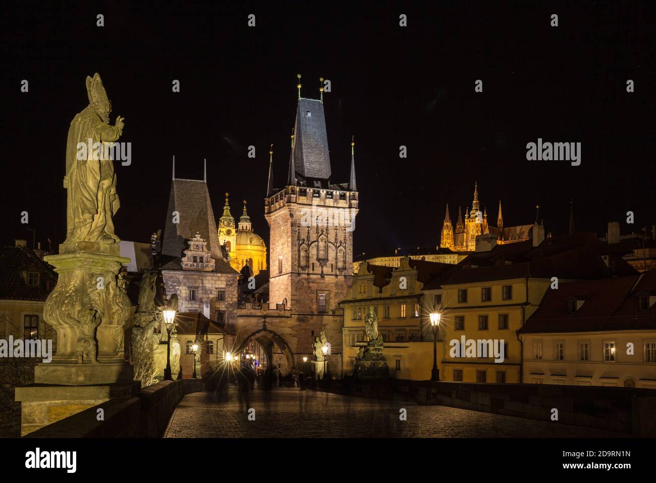 Beautiful night view of the light illuminated Prague Castle and St. Vitus Cathedral in Mala Strana old town by Vltava River from Charles Bridge, Pragu Stock Photo