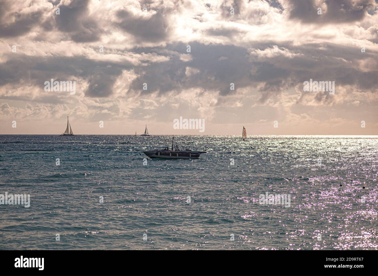 Boats on the sea on the horizon in Bayahibe, Dominican Republic Stock Photo