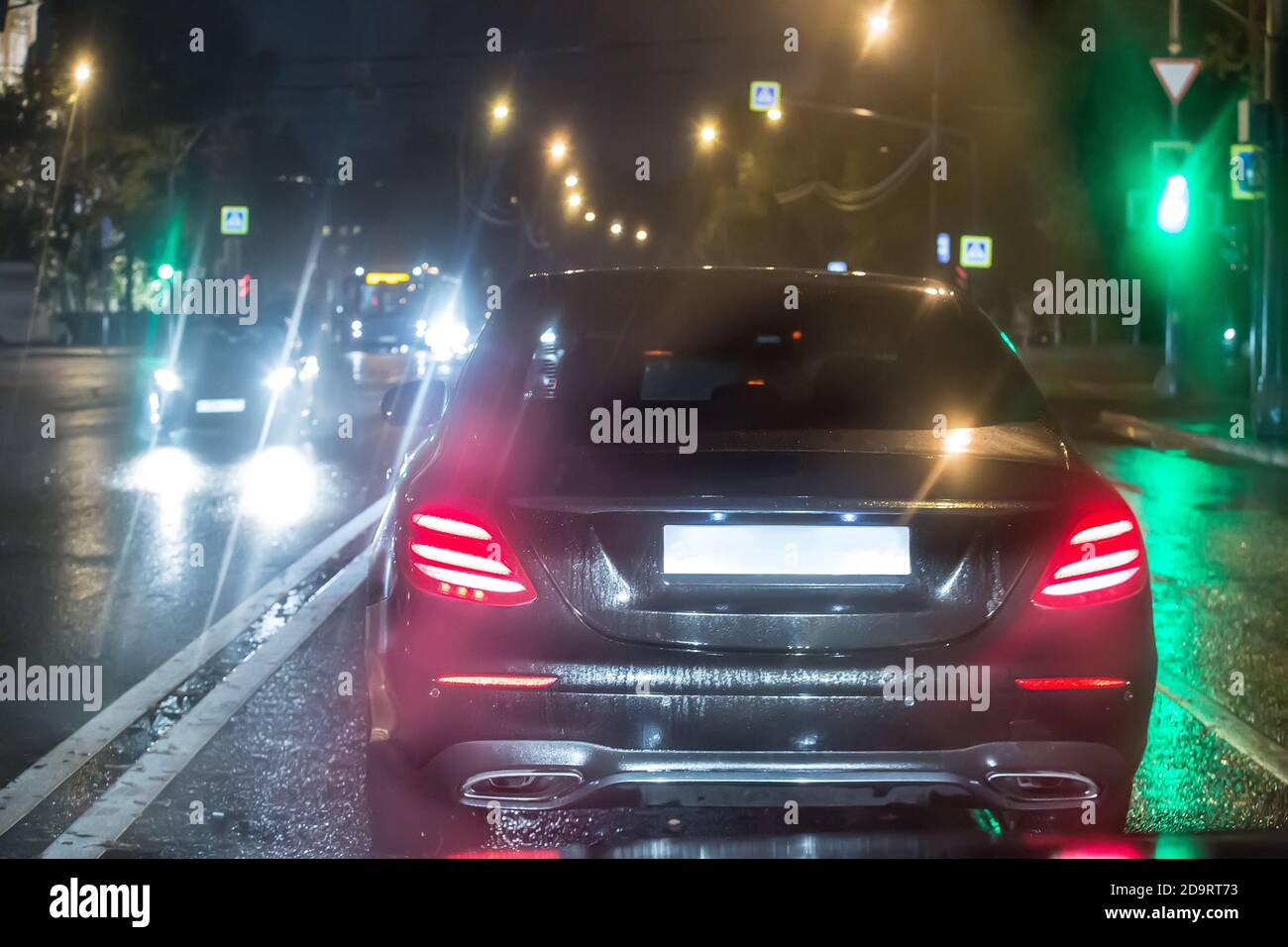 Driving on dark rainy night hi-res stock photography and images - Alamy