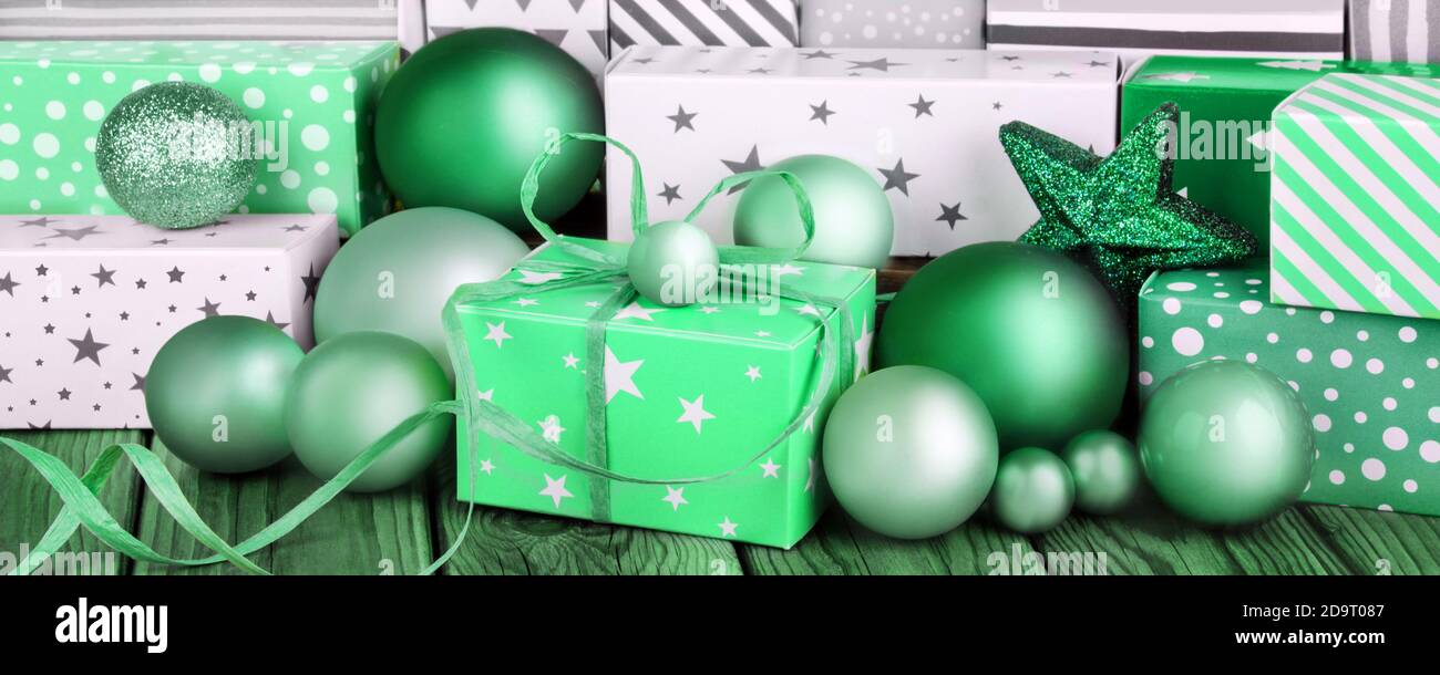 Green Christmas gifts and decorations close up Stock Photo