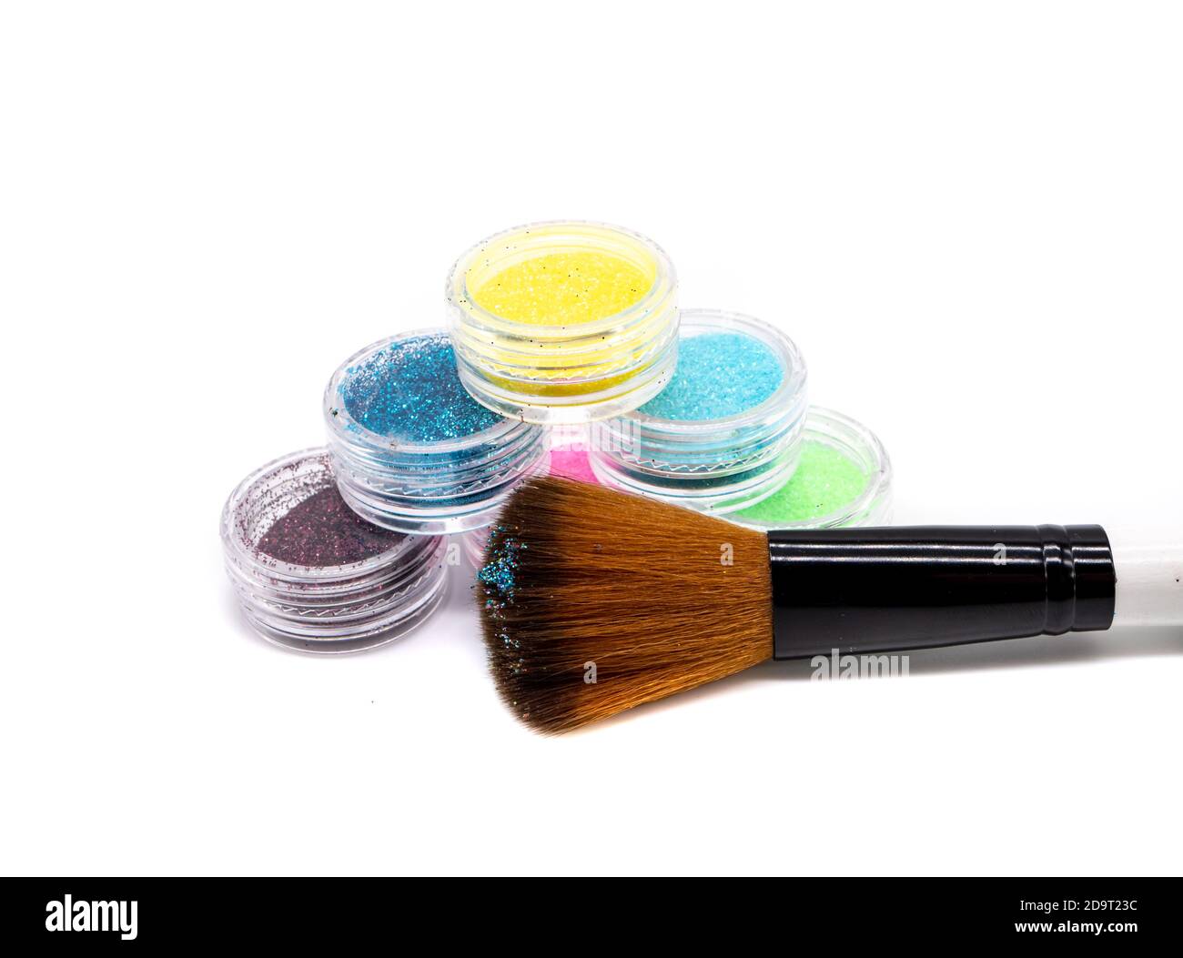 Glitter paint with brush isolated on white background Stock Photo