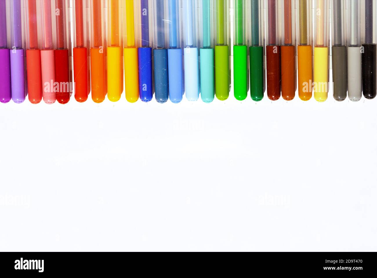 Multicolored markers or felt-tip pens on a white background. Stock Photo