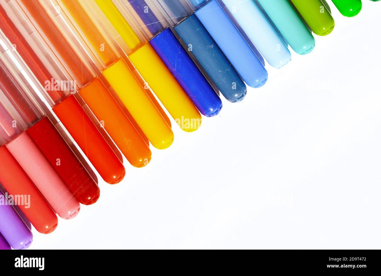 Multicolored markers or felt-tip pens on a white background. Stock Photo