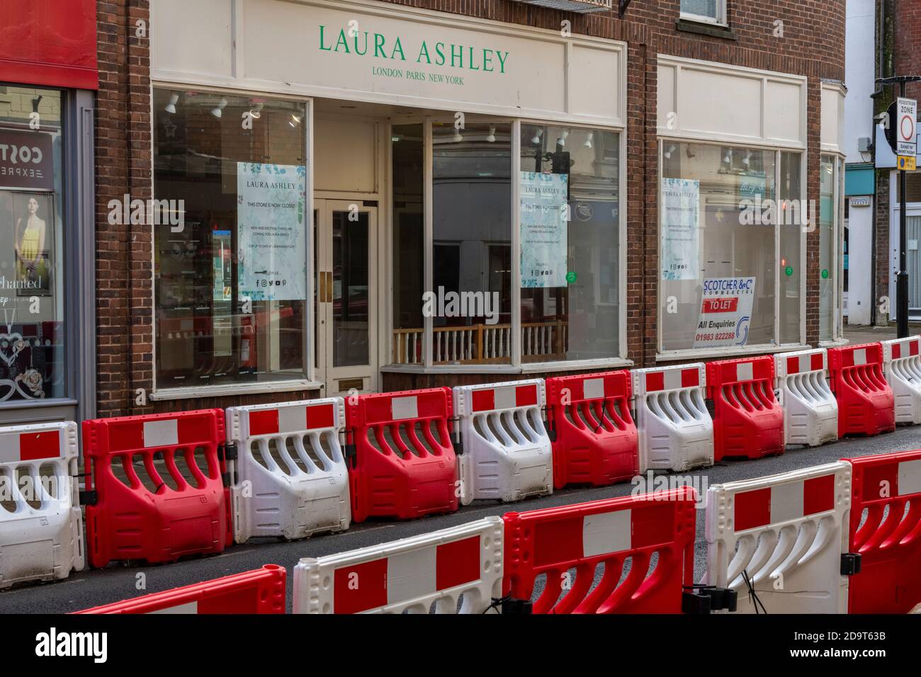 an empty laura ashley shop after closing down on the high street in a