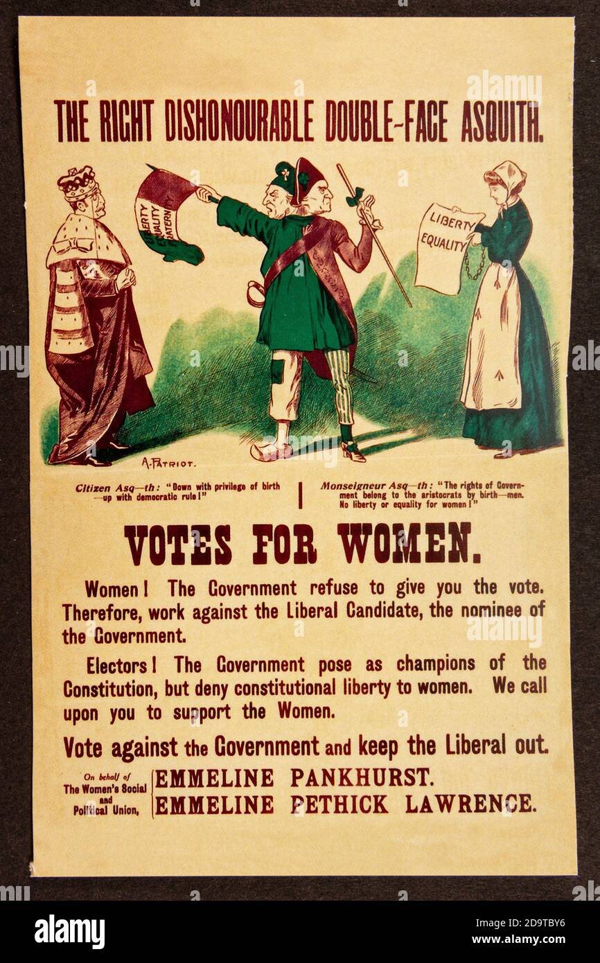 A 'Votes For Women' poster, 'The Right Dishonorable Double-face Asquith', replica memorabilia relating to the Suffragette Movement in Britain. Stock Photo