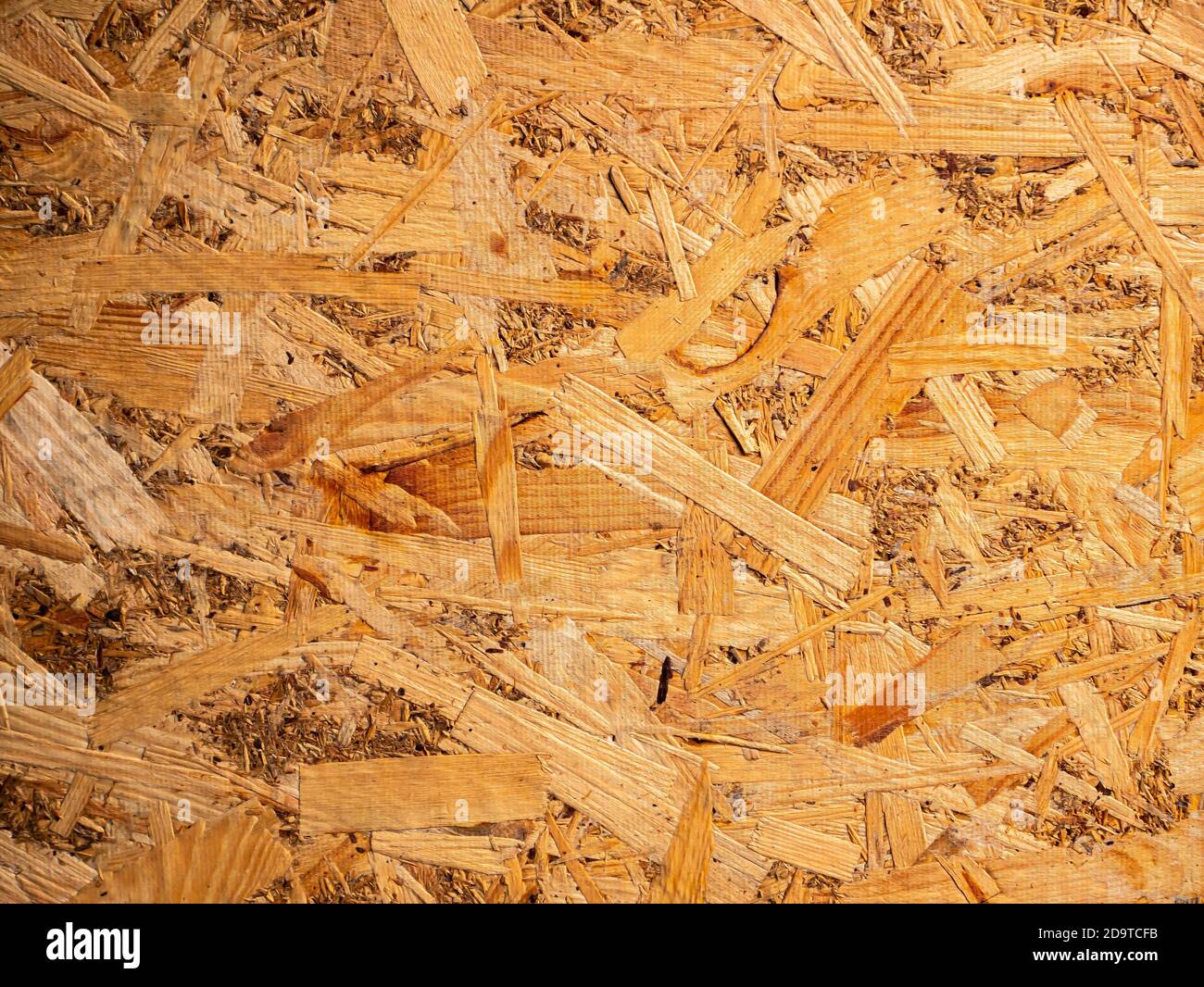 The structured texture of the wood fiber panel. Chipboard. Wood board  texture. Timber processing industry. Board. Woodworking. Sawmill. Waste  from woo Stock Photo - Alamy
