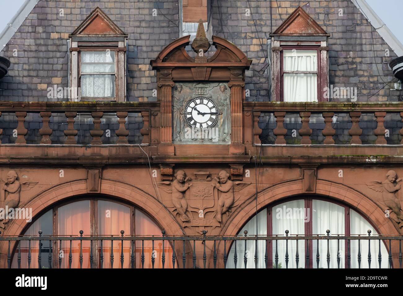 clock and architectural detail from St Georges Mansions building, Charing Cross, Woodlands conservation area, Glasgow, Scotland, UK Stock Photo