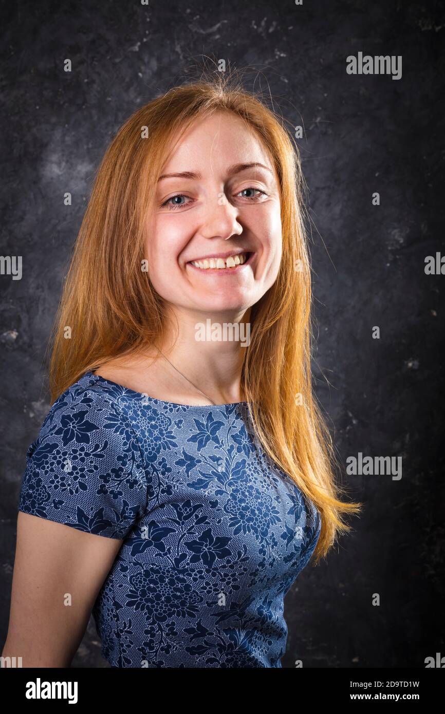 Pretty young woman studio portrait Stock Photo - Alamy
