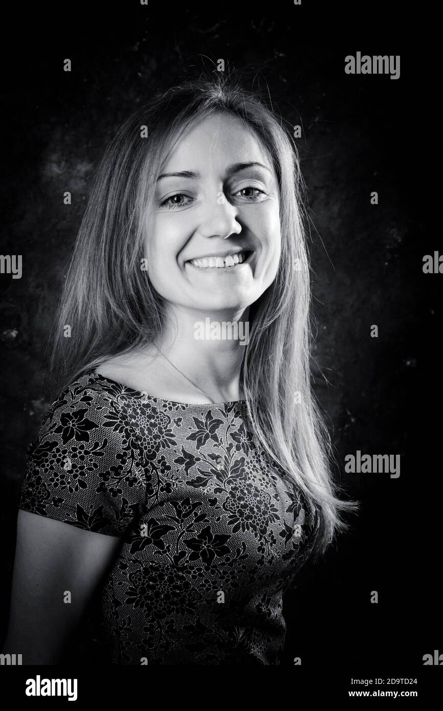 Pretty young woman studio portrait Stock Photo - Alamy