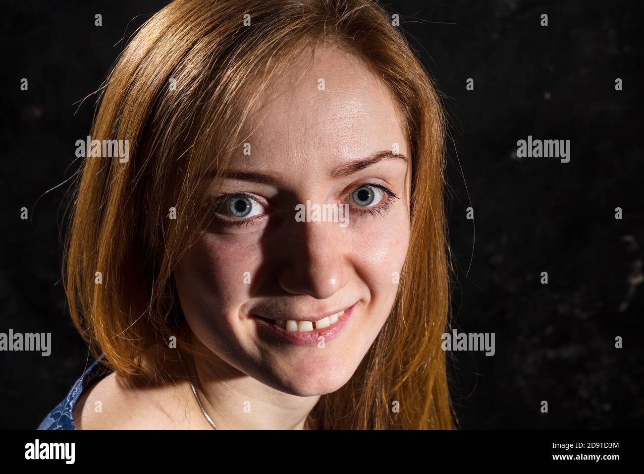Pretty young woman studio portrait Stock Photo - Alamy