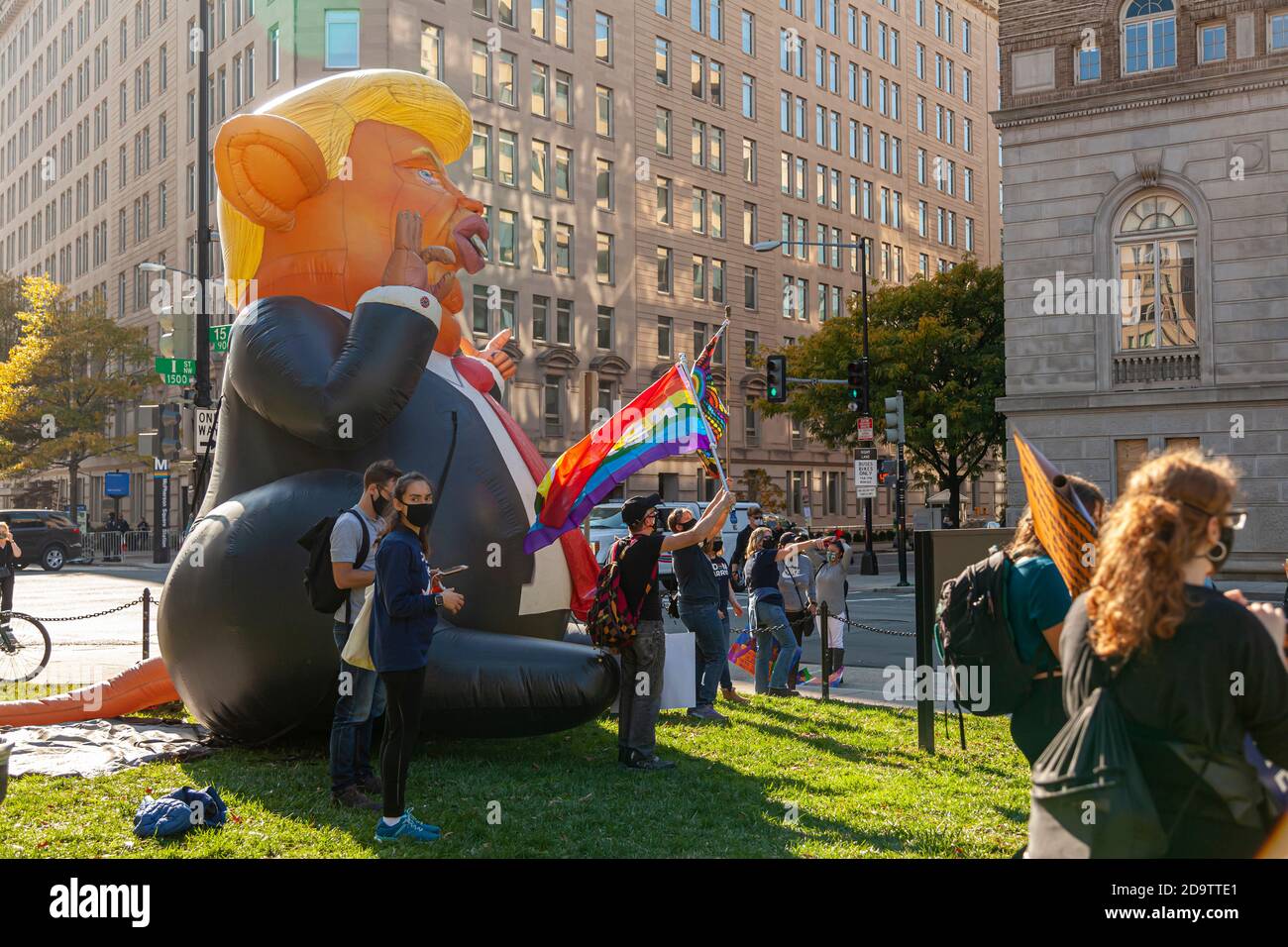 Washington DC, USA 11/06/2020: Protesters near White house following defeat of Donald Trump in US Elections. They gather around a giant funny mascot o Stock Photo